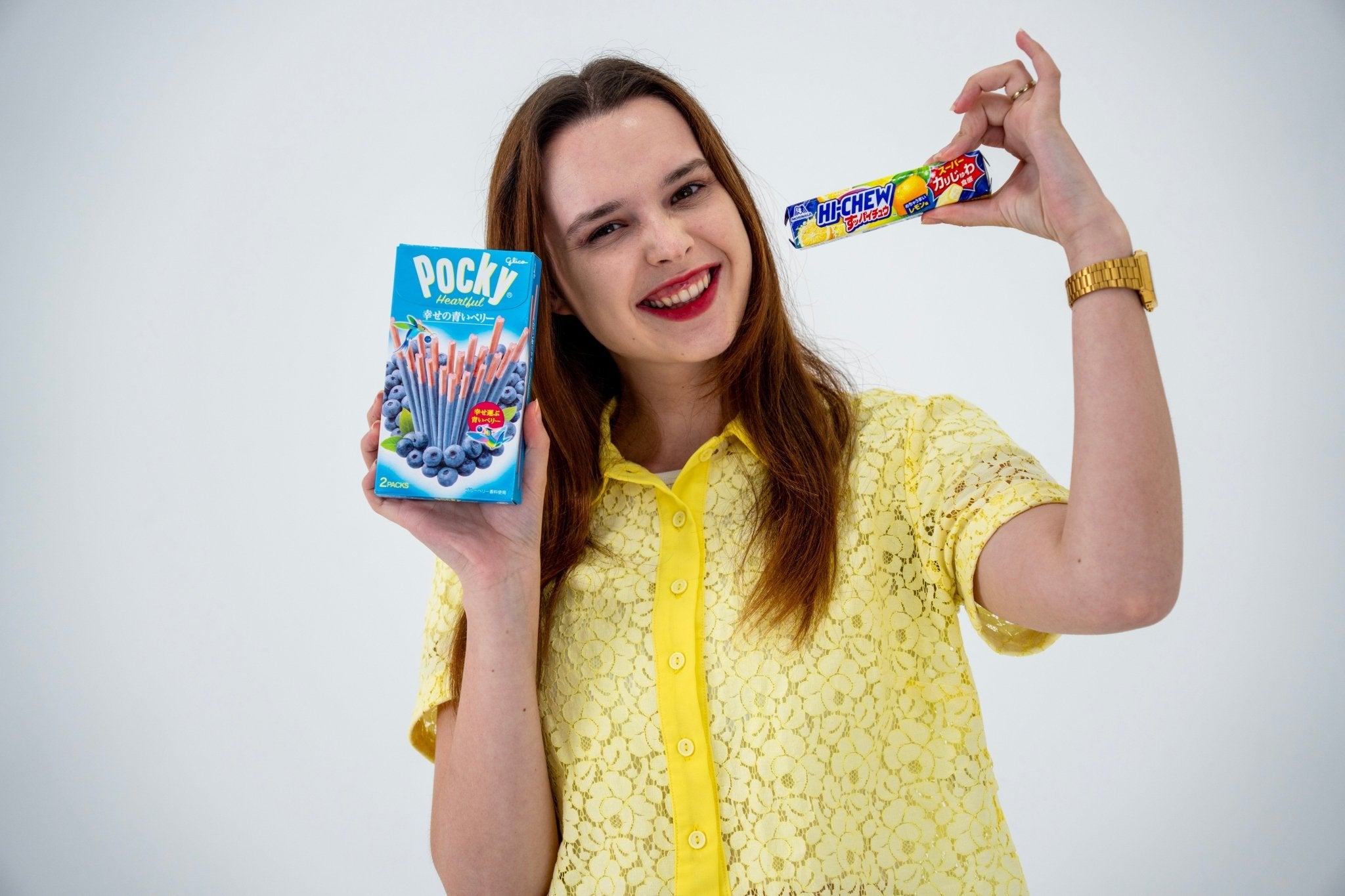 girl holding Japanese snacks