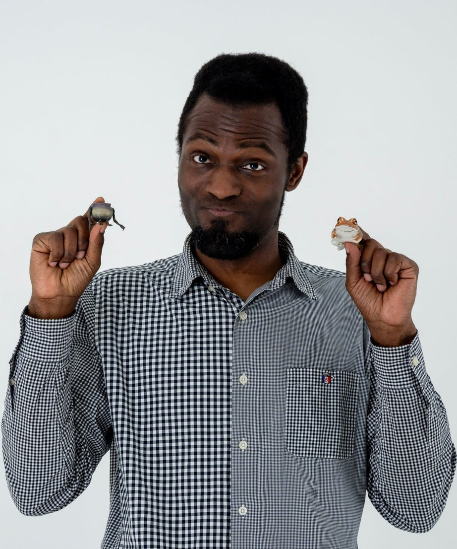 Man holding Japanese capsule toys